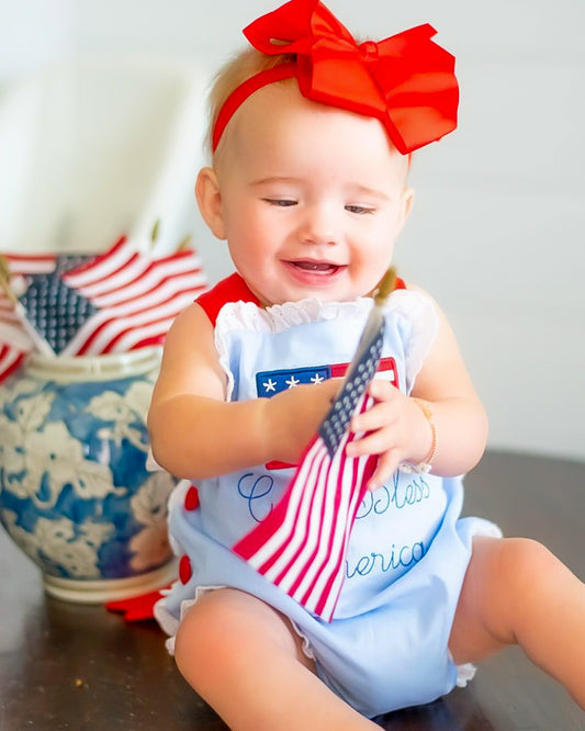 God Bless America Eyelet Ruffle Bow Back Sunsuit